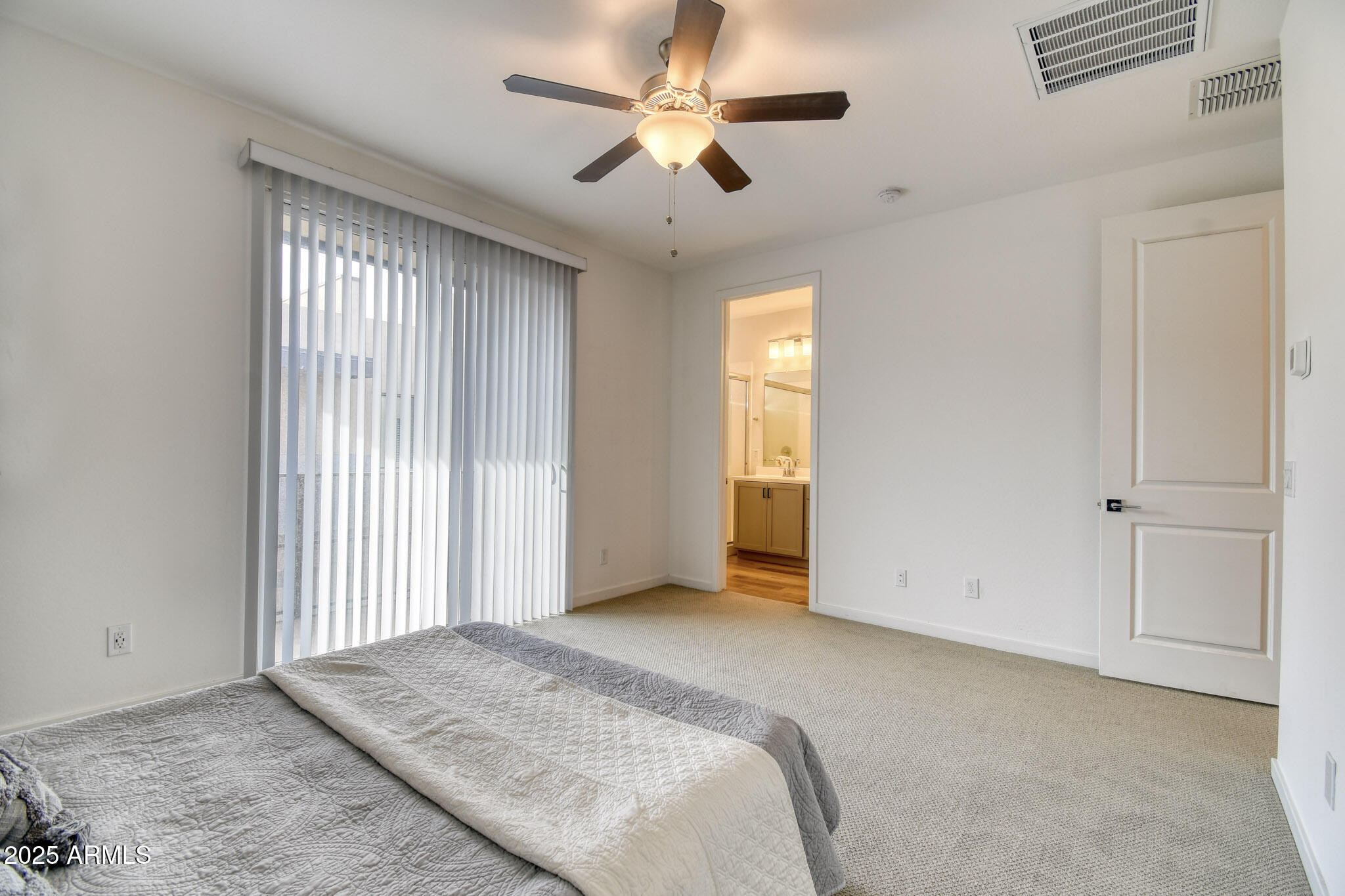901 South Smith Road, Unit 1065 Tempe, AZ 85281 - Photo 7 of 26 a view of a livingroom with a chandelier fan and windows