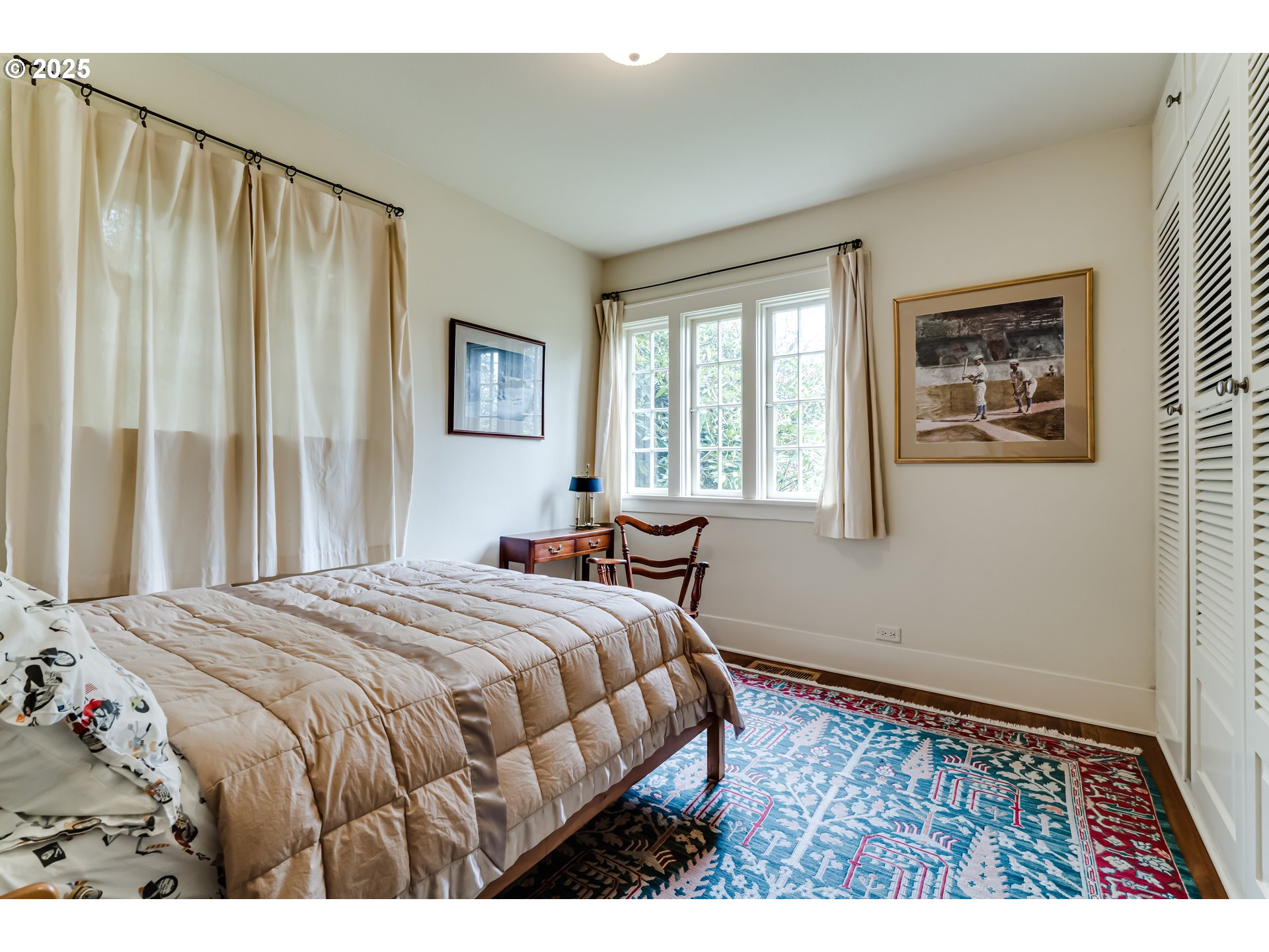 1976 University Street Eugene, OR 97403 - Photo 11 of 36 a bedroom with a bed and a window