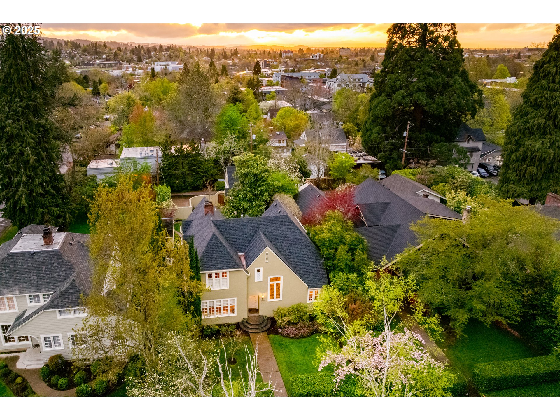1976 University Street Eugene, OR 97403 - Photo 2 of 36 an aerial view of residential houses with outdoor space and trees