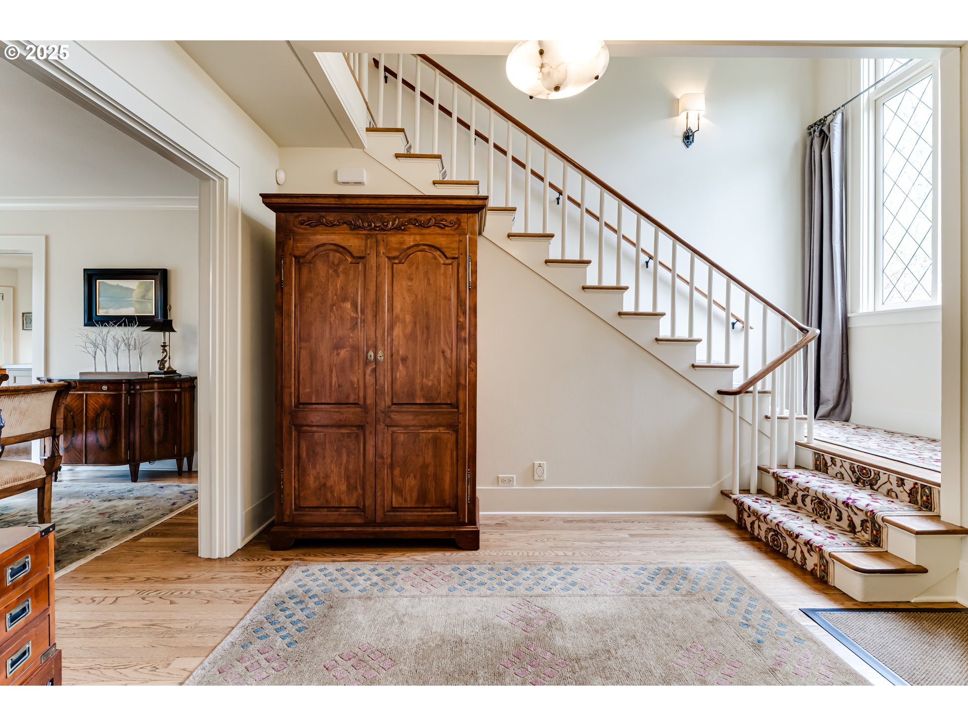 1976 University Street Eugene, OR 97403 - Photo 3 of 36 a view of an entryway with wooden floor
