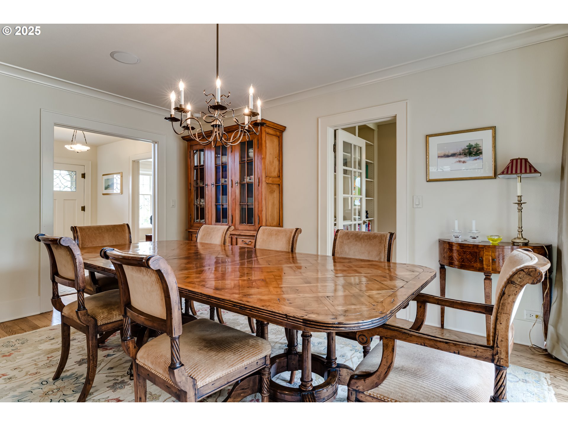 1976 University Street Eugene, OR 97403 - Photo 6 of 36 a view of a dining room with furniture and a chandelier