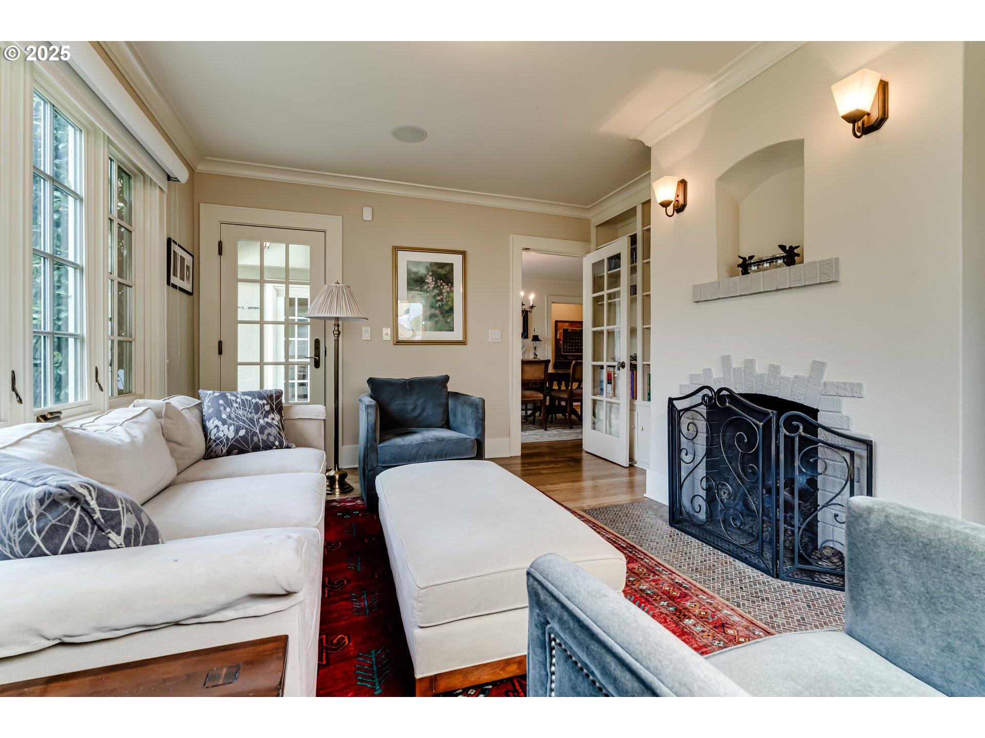 1976 University Street Eugene, OR 97403 - Photo 7 of 36 a living room with furniture and a fireplace