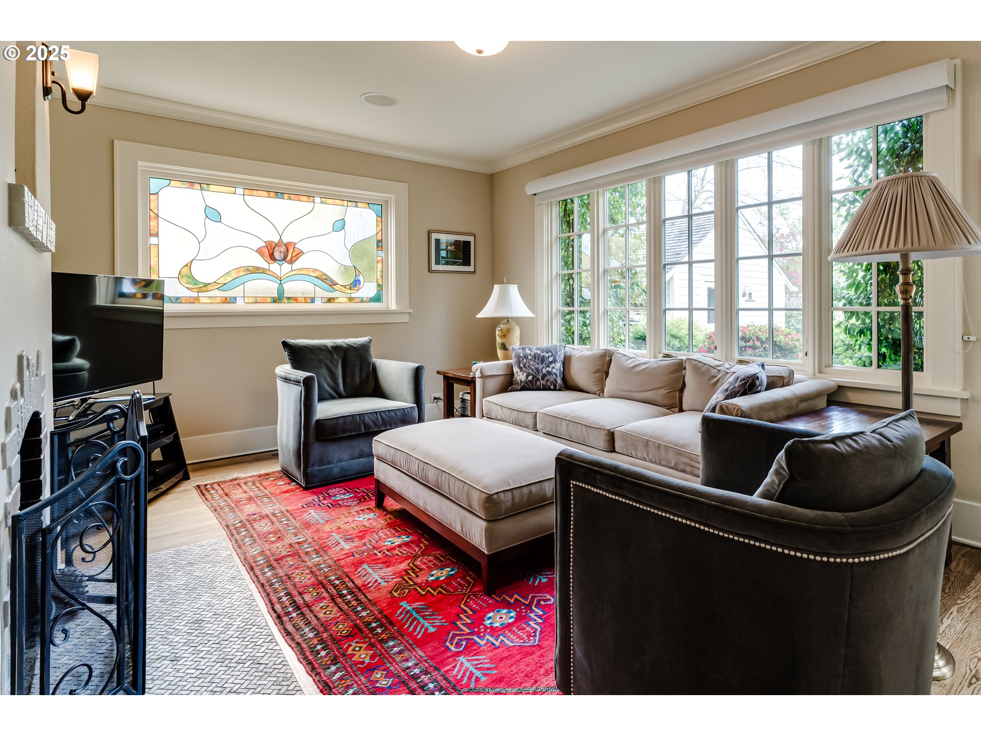 1976 University Street Eugene, OR 97403 - Photo 8 of 36 a living room with furniture and a flat screen tv