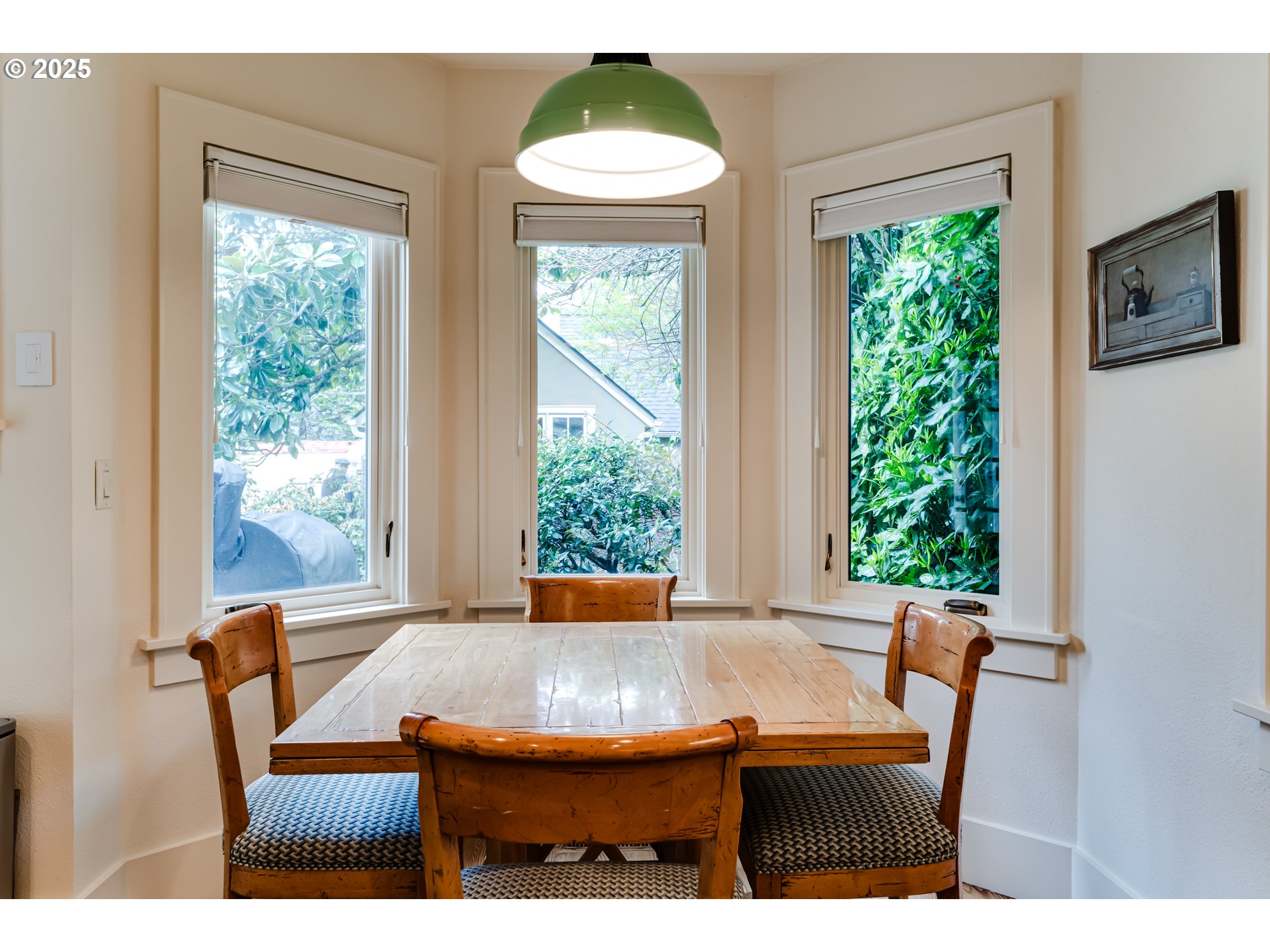 1976 University Street Eugene, OR 97403 - Photo 9 of 36 a view of a dining room with furniture window and outside view