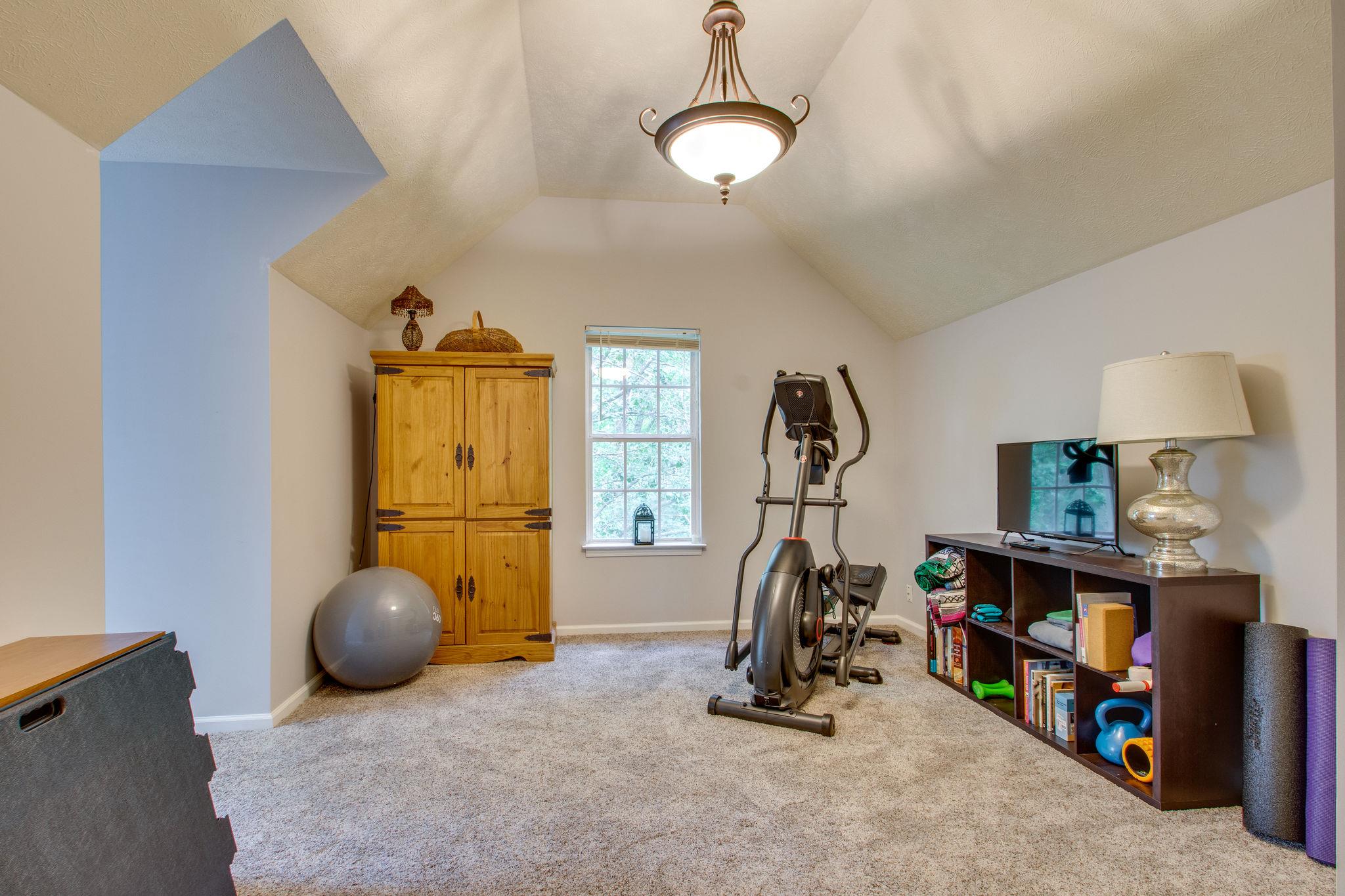 1020 Anderson Road Dickson, TN 37055 - Photo 24 of 28 a view of a room with gym equipment