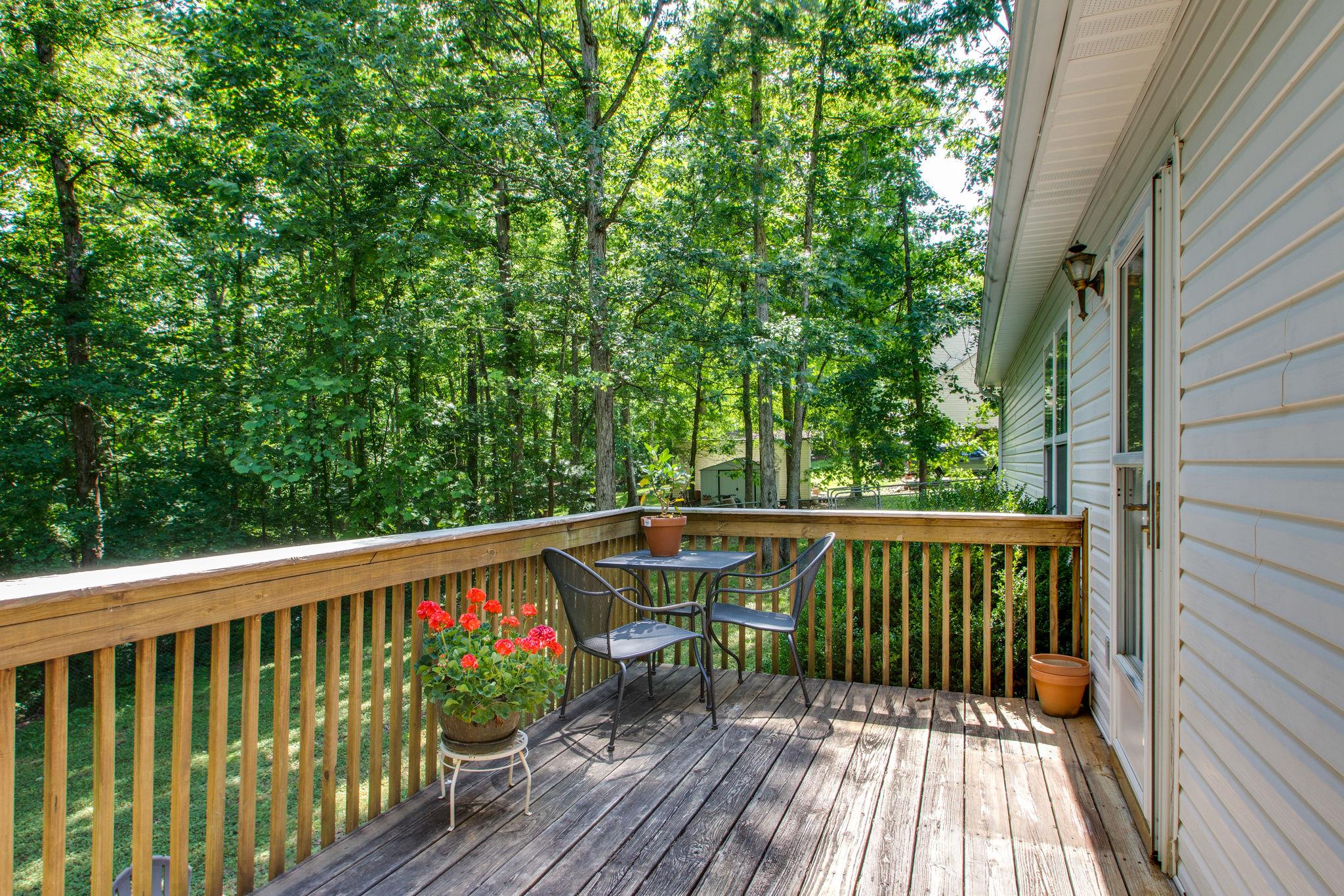 1020 Anderson Road Dickson, TN 37055 - Photo 25 of 28 a view of balcony with wooden floor and outdoor seating