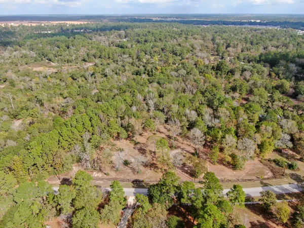 a view of a field with an outdoor space