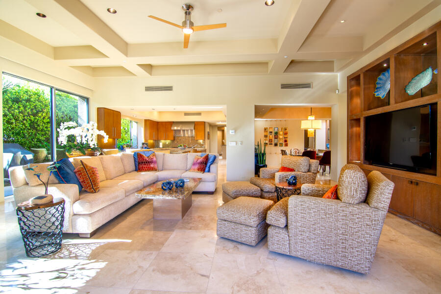 630 North Cahuilla Road Palm Springs, CA 92262 - Photo 23 of 65 a living room with furniture kitchen view and a large window