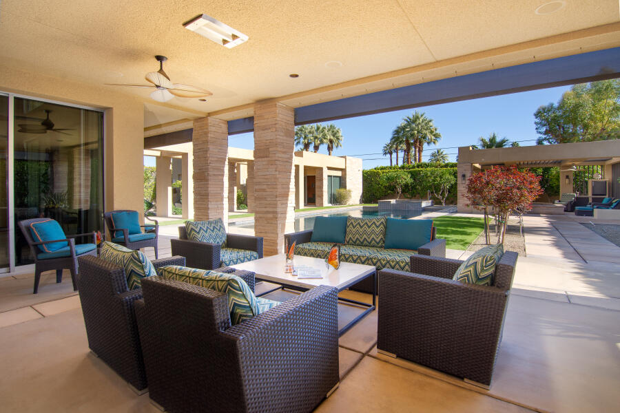 630 North Cahuilla Road Palm Springs, CA 92262 - Photo 24 of 65 a living room with furniture potted plant floor and a large window
