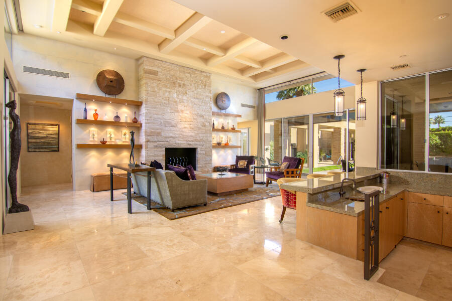 630 North Cahuilla Road Palm Springs, CA 92262 - Photo 25 of 65 a living room with fireplace furniture and a large window