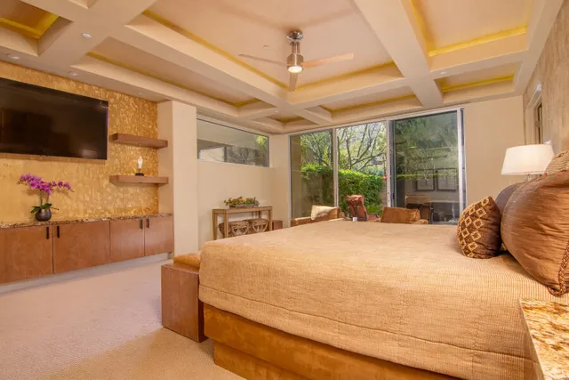 a bathroom with a sink toilet a mirror and shower