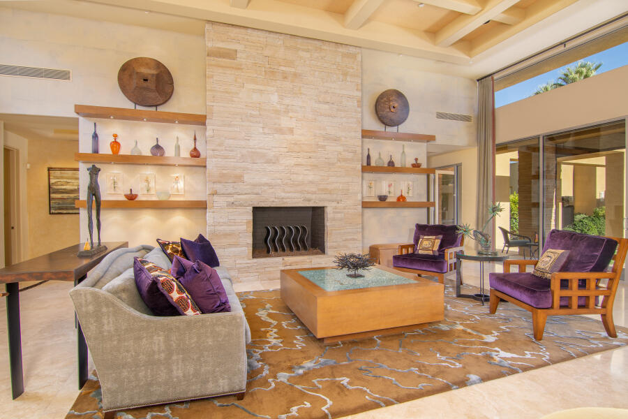 630 North Cahuilla Road Palm Springs, CA 92262 - Photo 3 of 65 a living room with furniture and a clock