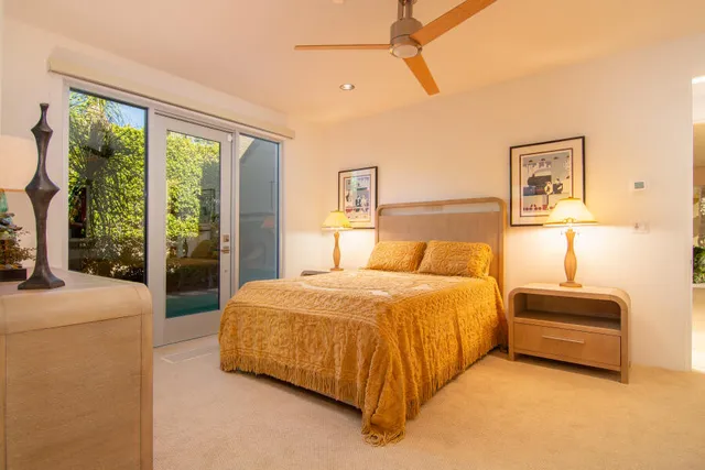 a kitchen with granite countertop a sink a stove and a granite counter top