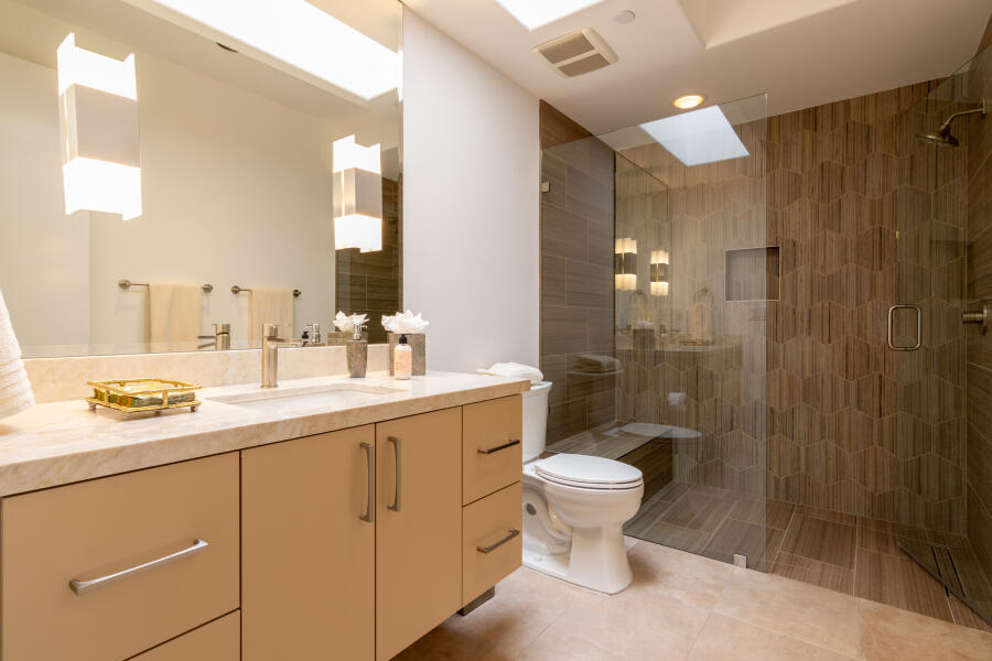 630 North Cahuilla Road Palm Springs, CA 92262 - Photo 40 of 65 a bathroom with a sink toilet a mirror and shower