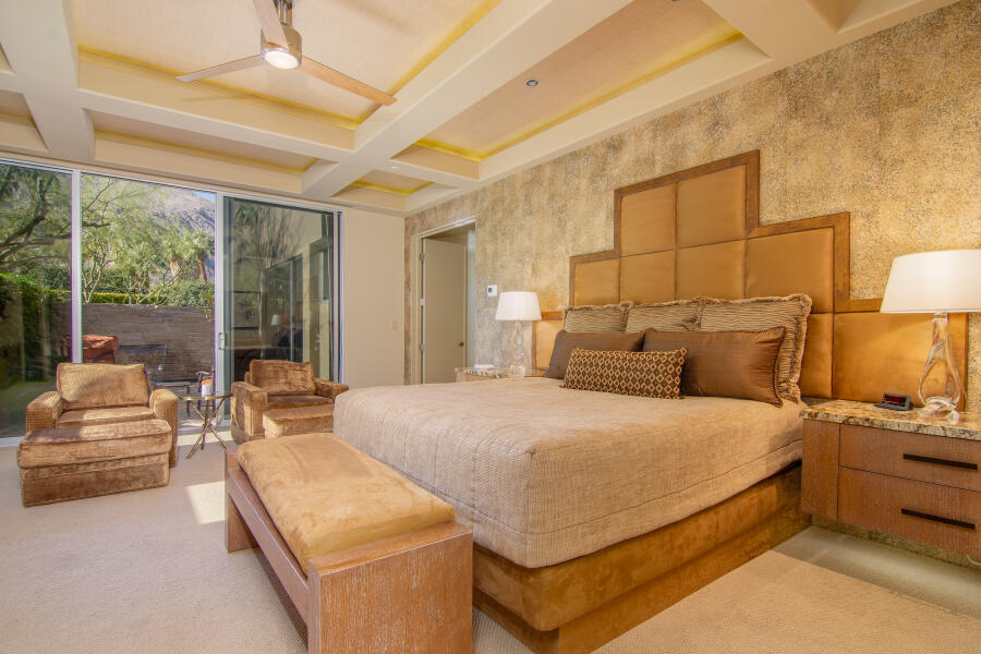 630 North Cahuilla Road Palm Springs, CA 92262 - Photo 4 of 65 a bed room with a bed and a couch