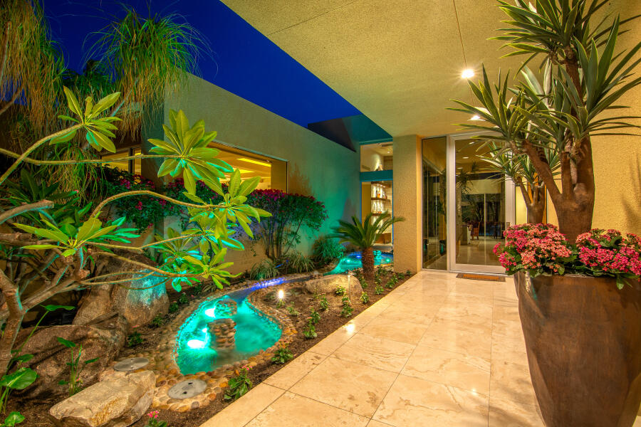 630 North Cahuilla Road Palm Springs, CA 92262 - Photo 5 of 65 a view of a potted plants in front of a house