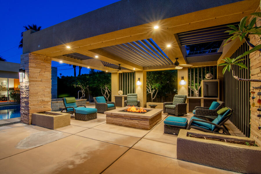 630 North Cahuilla Road Palm Springs, CA 92262 - Photo 6 of 65 a outdoor space with patio couches and a fireplace