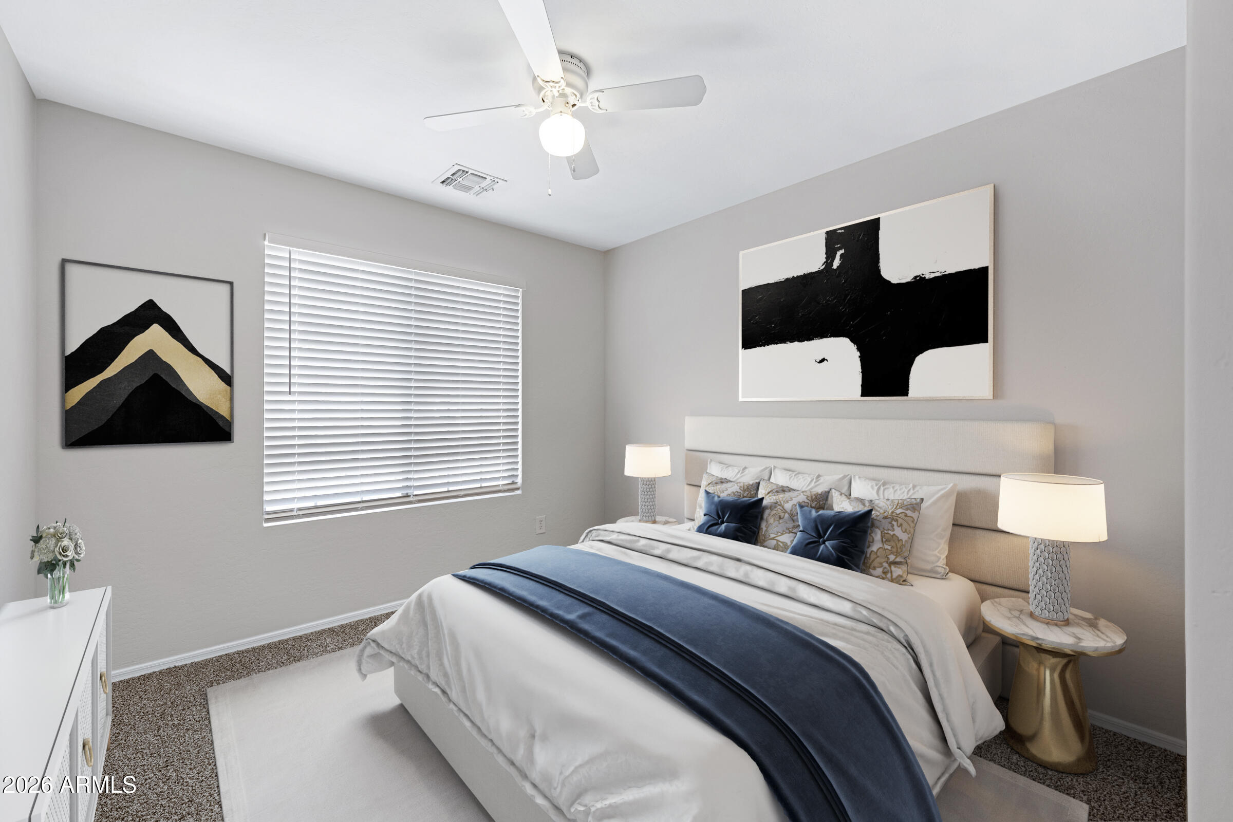 19408 North Braden Road Maricopa, AZ 85138 - Photo 25 of 51 a bedroom with a bed and a painting on the wall