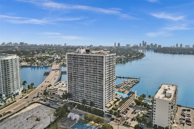 a view of a city with tall buildings