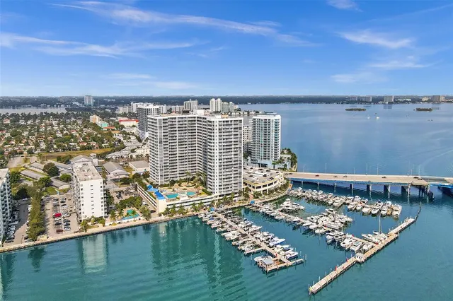 a view of city with ocean