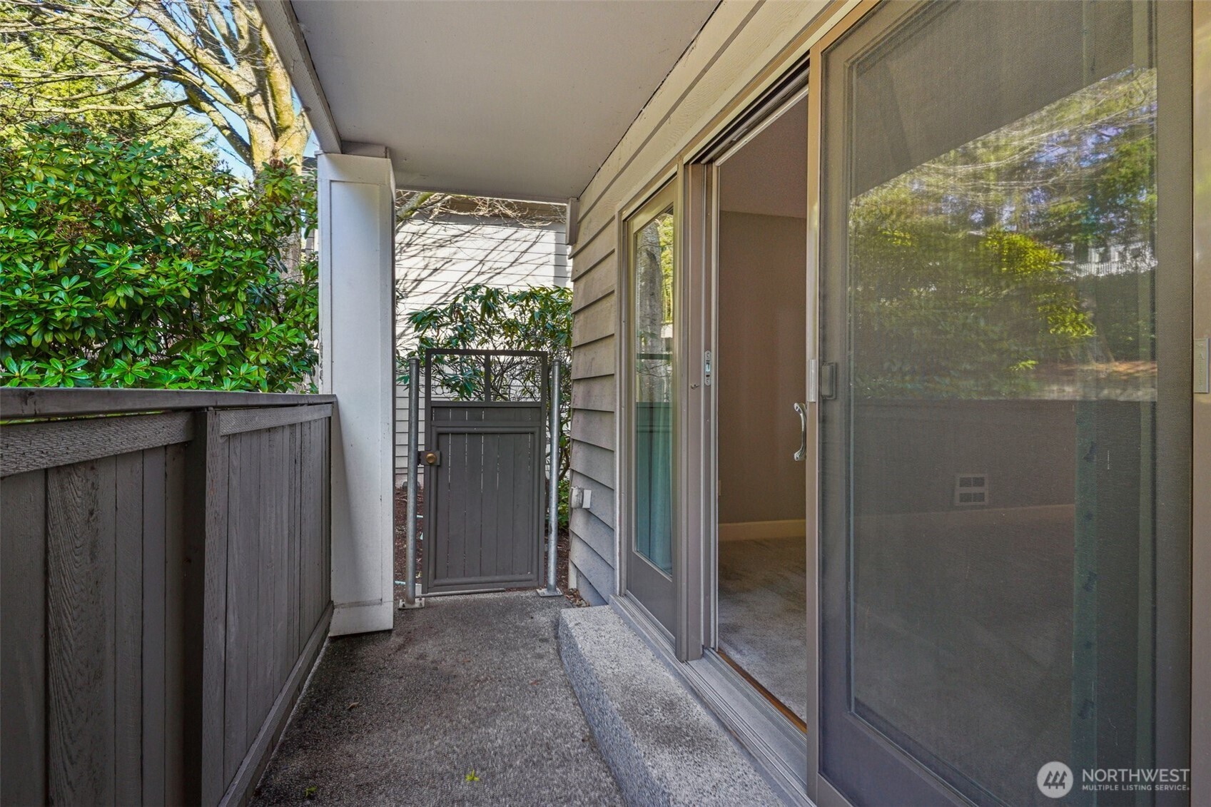 8025 234th Street Southwest, Unit 116 Edmonds, WA 98026 - Photo 15 of 26 a view of a glass door