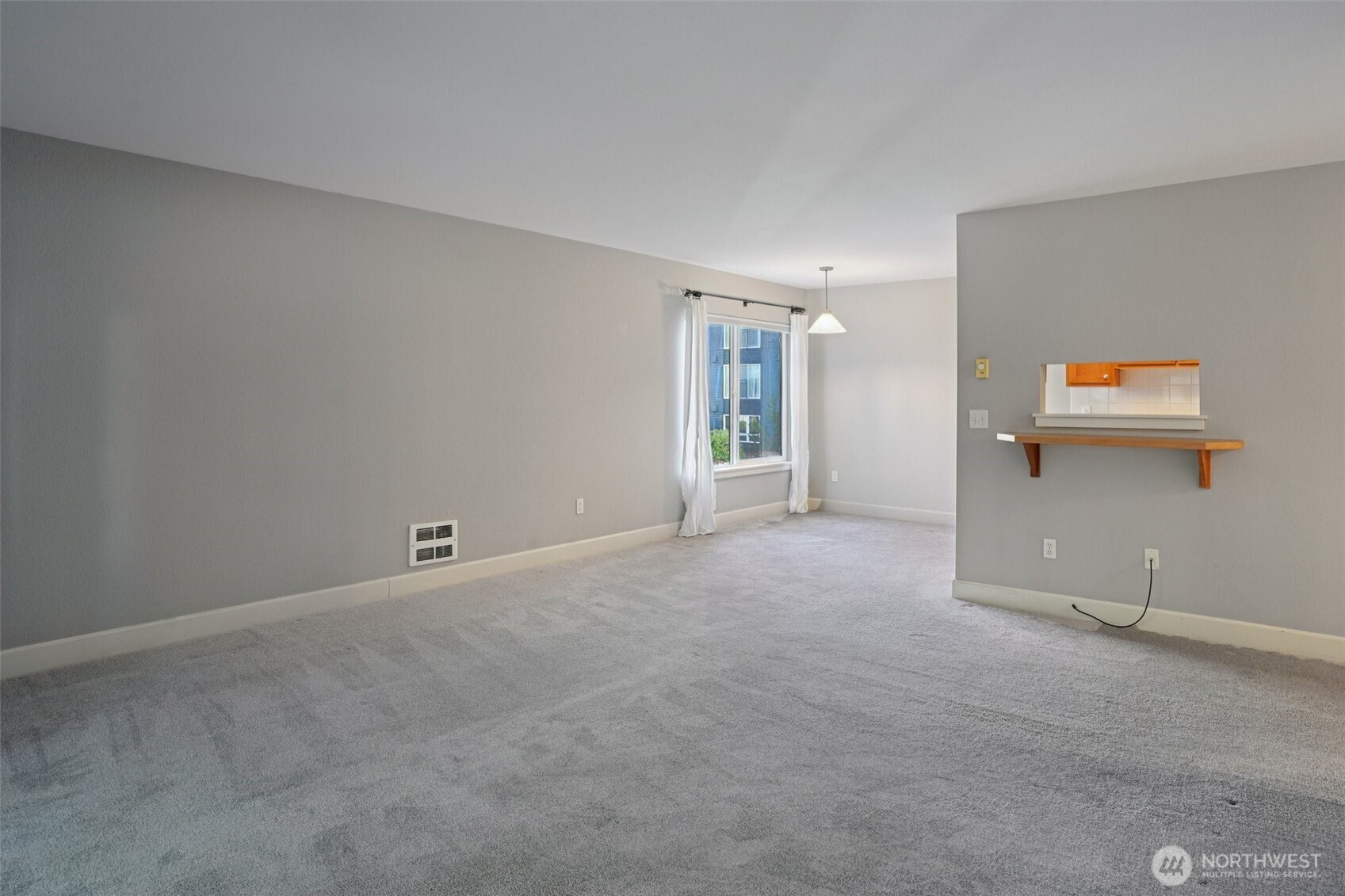 8025 234th Street Southwest, Unit 116 Edmonds, WA 98026 - Photo 4 of 26 a view of an empty room with a window