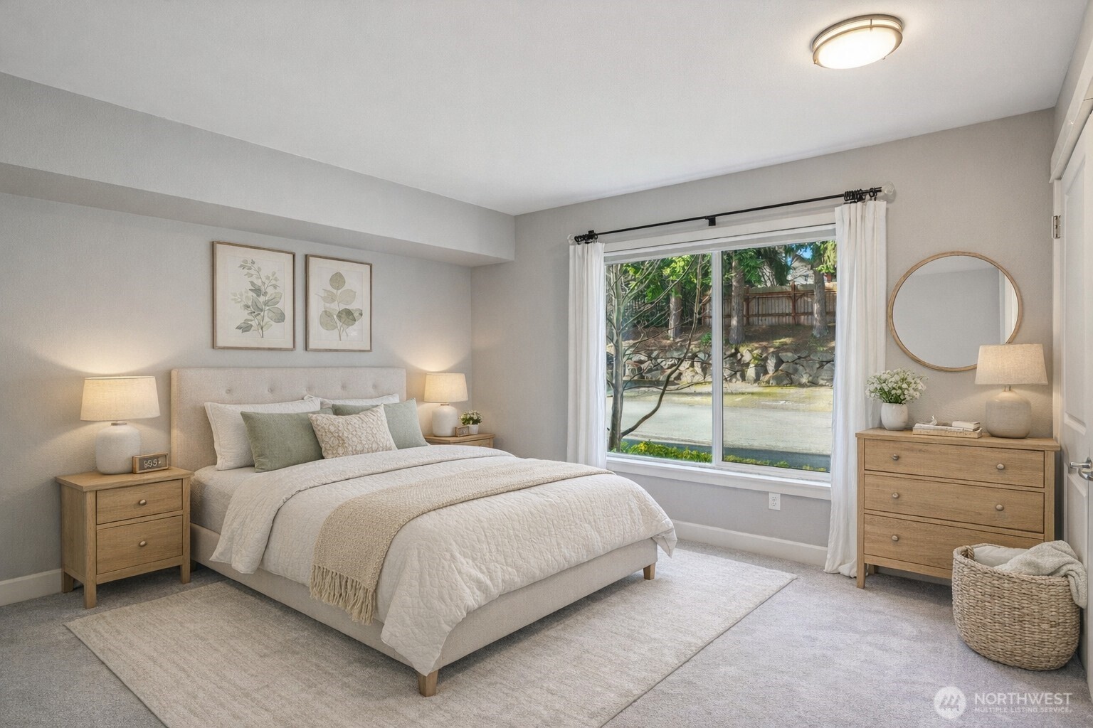 8025 234th Street Southwest, Unit 116 Edmonds, WA 98026 - Photo 9 of 26 a bedroom with a bed and a dresser next to a window