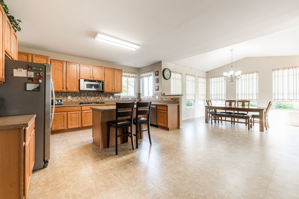 508 Winding Trail Genoa, IL 60135 - Photo 12 of 41 a kitchen with a table and chairs in it