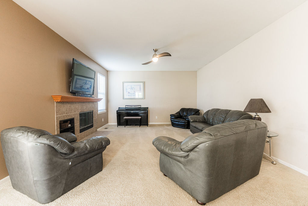 508 Winding Trail Genoa, IL 60135 - Photo 15 of 41 a living room with furniture a fireplace