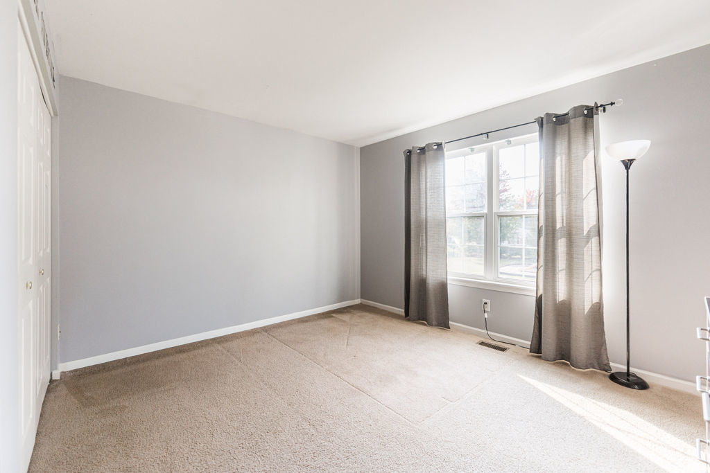 508 Winding Trail Genoa, IL 60135 - Photo 25 of 41 an empty room with windows