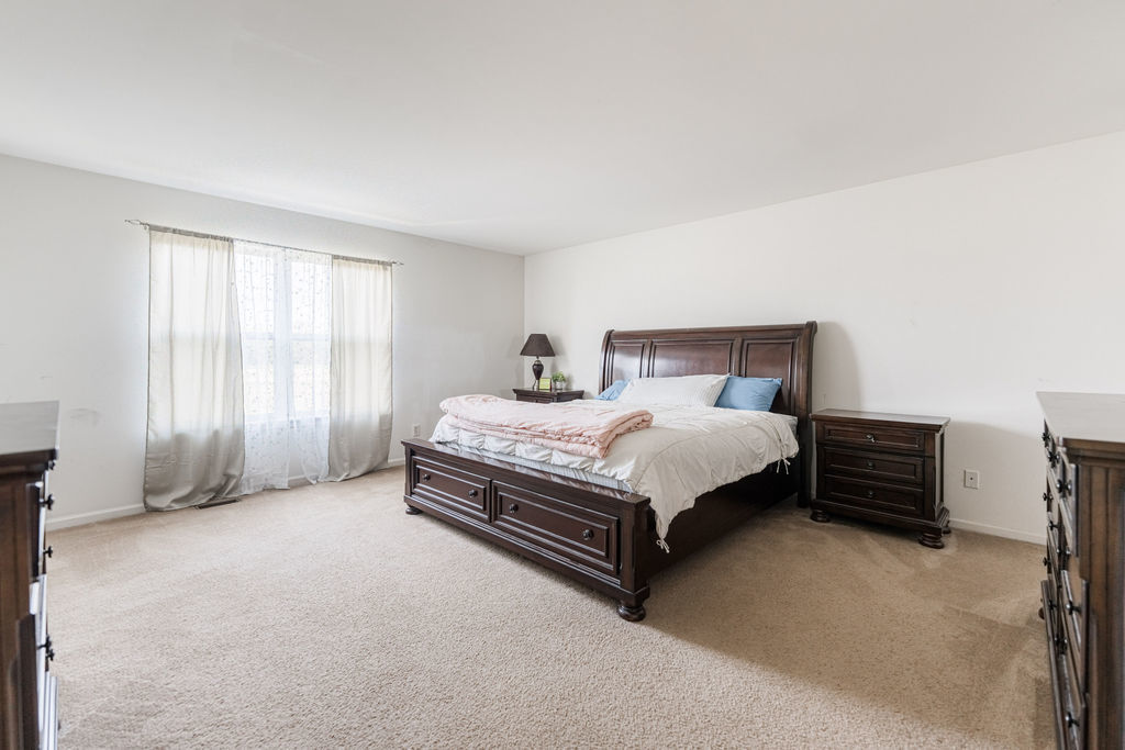 508 Winding Trail Genoa, IL 60135 - Photo 29 of 41 a bedroom with a bed and a window