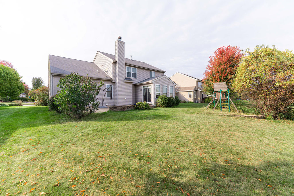 508 Winding Trail Genoa, IL 60135 - Photo 40 of 41 a front view of a house with garden