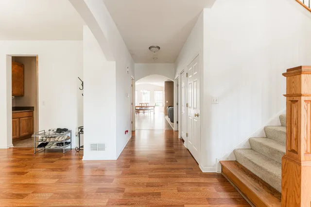 a view of a living room and hardwood floor