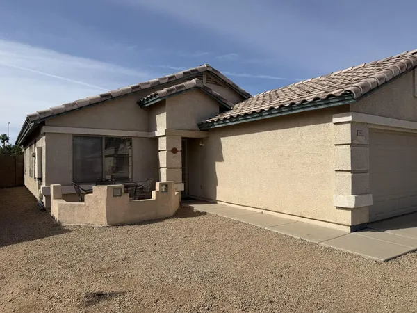 a view of a house with patio