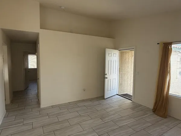 an empty room with windows