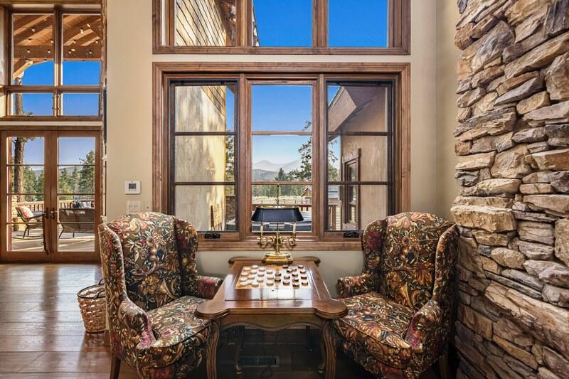 35650 Pyramid Peak Road Mountain Center, CA 92561 - Photo 12 of 58 a living room with furniture and a large window