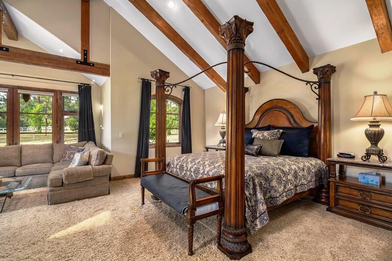 35650 Pyramid Peak Road Mountain Center, CA 92561 - Photo 25 of 58 a bedroom with a bed couch and window