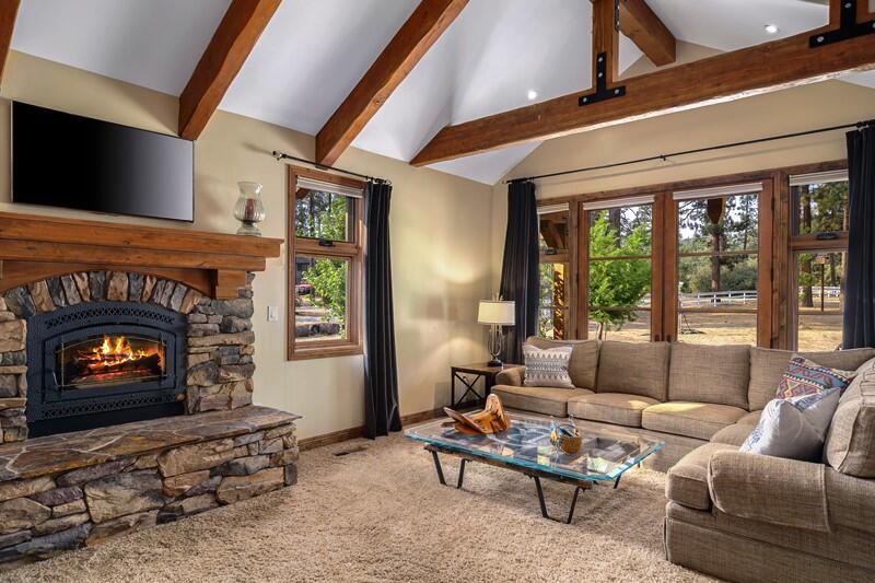 35650 Pyramid Peak Road Mountain Center, CA 92561 - Photo 26 of 58 a living room with furniture and a fireplace