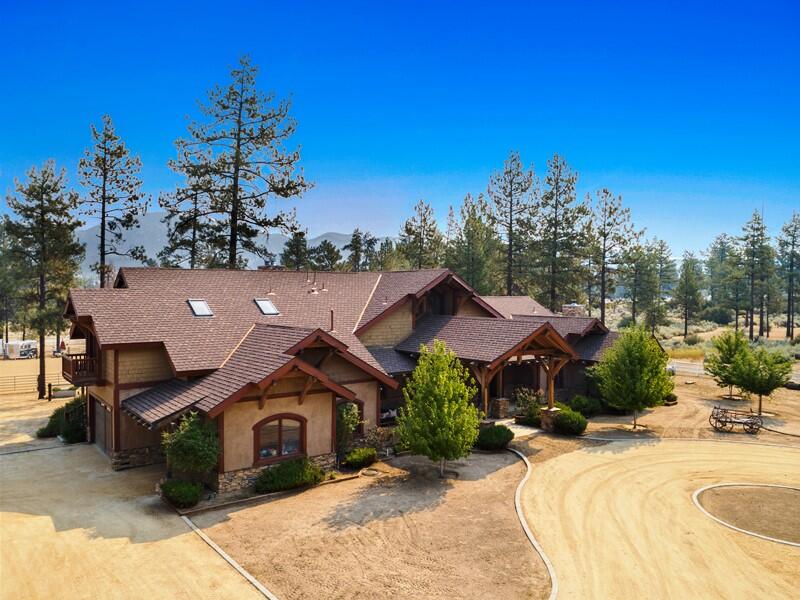 35650 Pyramid Peak Road Mountain Center, CA 92561 - Photo 4 of 58 a front view of a house with a yard
