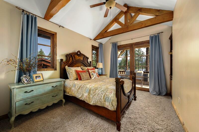 35650 Pyramid Peak Road Mountain Center, CA 92561 - Photo 32 of 58 a bedroom with a bed and large windows