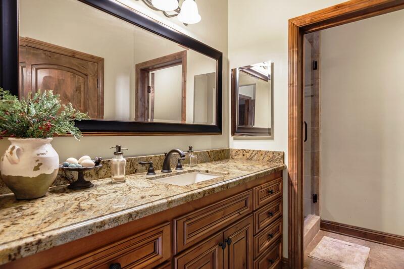35650 Pyramid Peak Road Mountain Center, CA 92561 - Photo 33 of 58 a bathroom with a granite countertop sink and a mirror