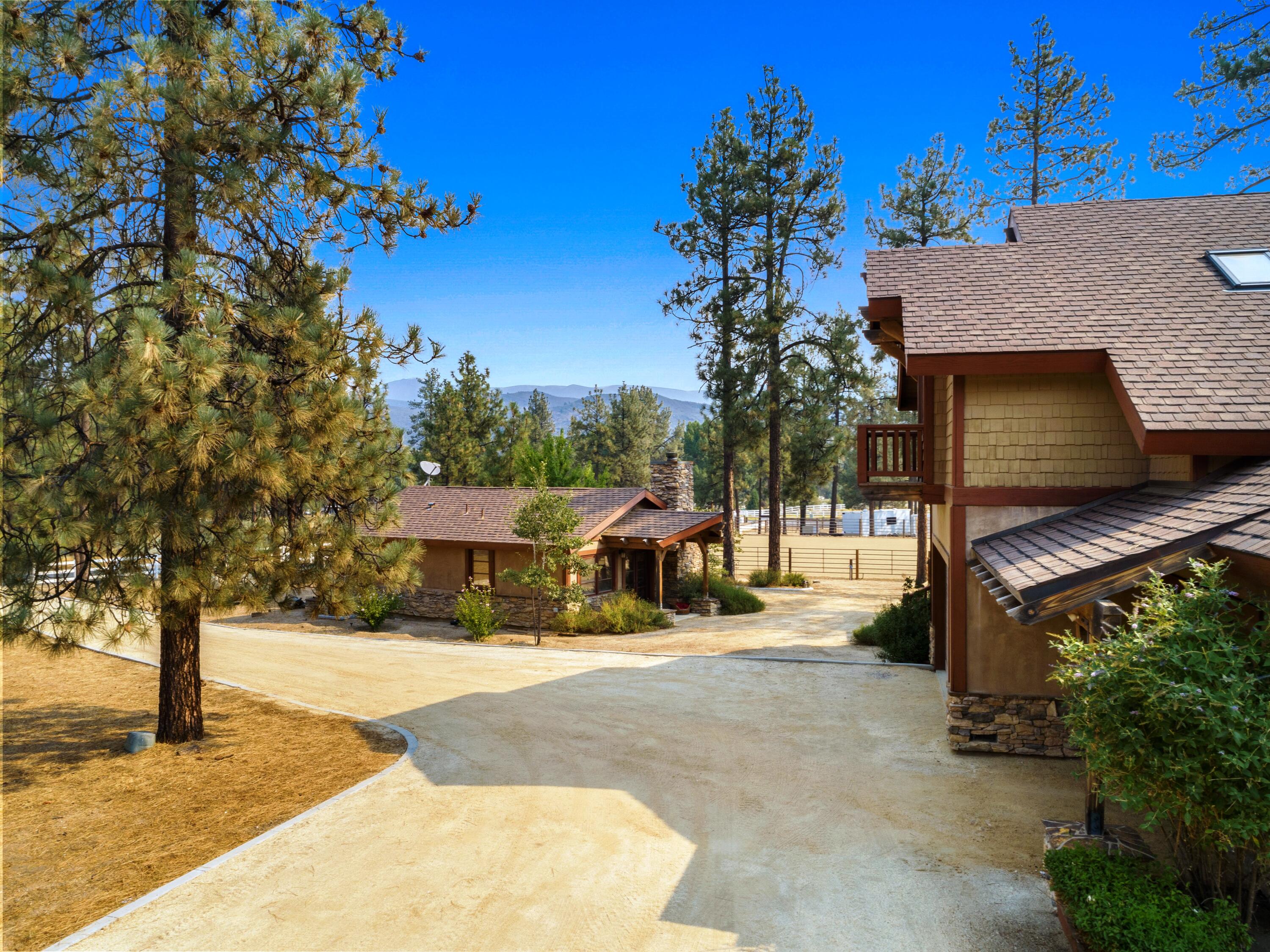 35650 Pyramid Peak Road Mountain Center, CA 92561 - Photo 5 of 58 a view of house with outdoor space and tree s