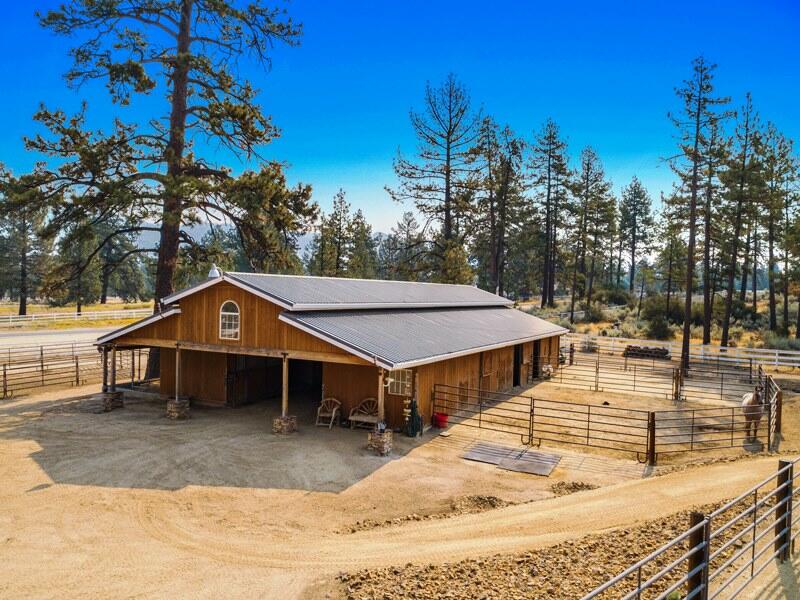 35650 Pyramid Peak Road Mountain Center, CA 92561 - Photo 53 of 58 a view of a house with a yard