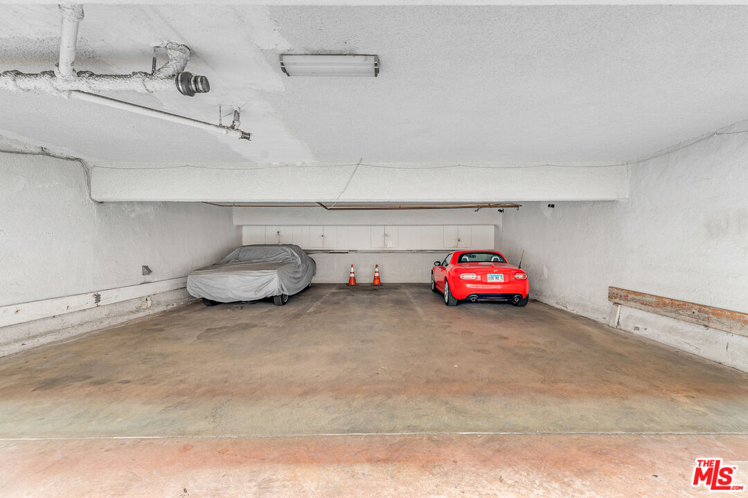 1812 North Gramercy Place, Unit 11 Los Angeles, CA 90028 - Photo 15 of 18 a car parked in a room