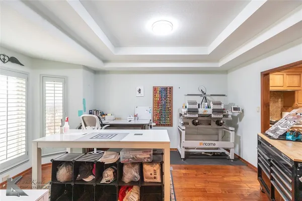 a kitchen with sink stove and cabinets