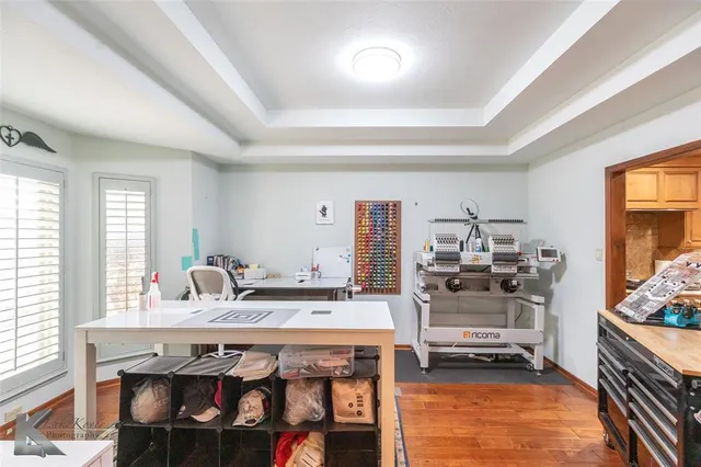 a kitchen with sink stove and cabinets