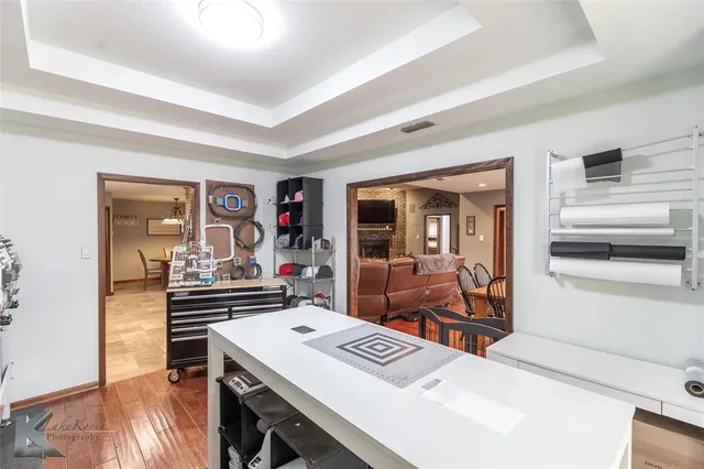 a view of a workspace with furniture