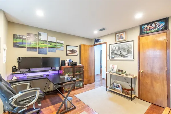 a workspace with furniture and a window