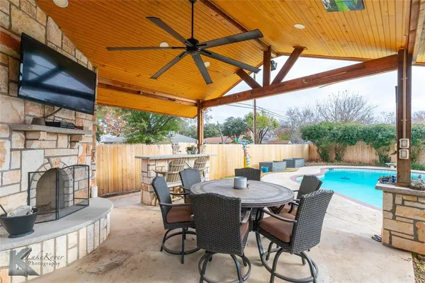 a view of an outdoor space with furniture