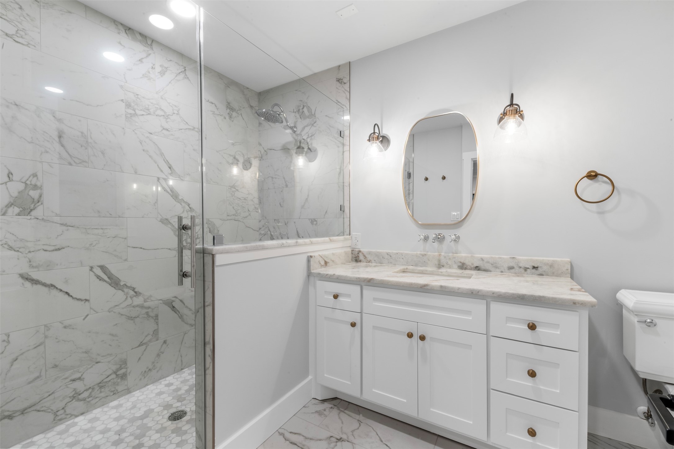 1723 Albans Road Houston, TX 77005 - Photo 21 of 50 a bathroom with a granite countertop sink a mirror and shower